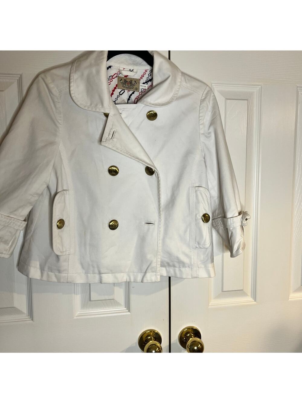 Crop jacket, 3/4 sleeves,Gold buttons and bows on each cuff.